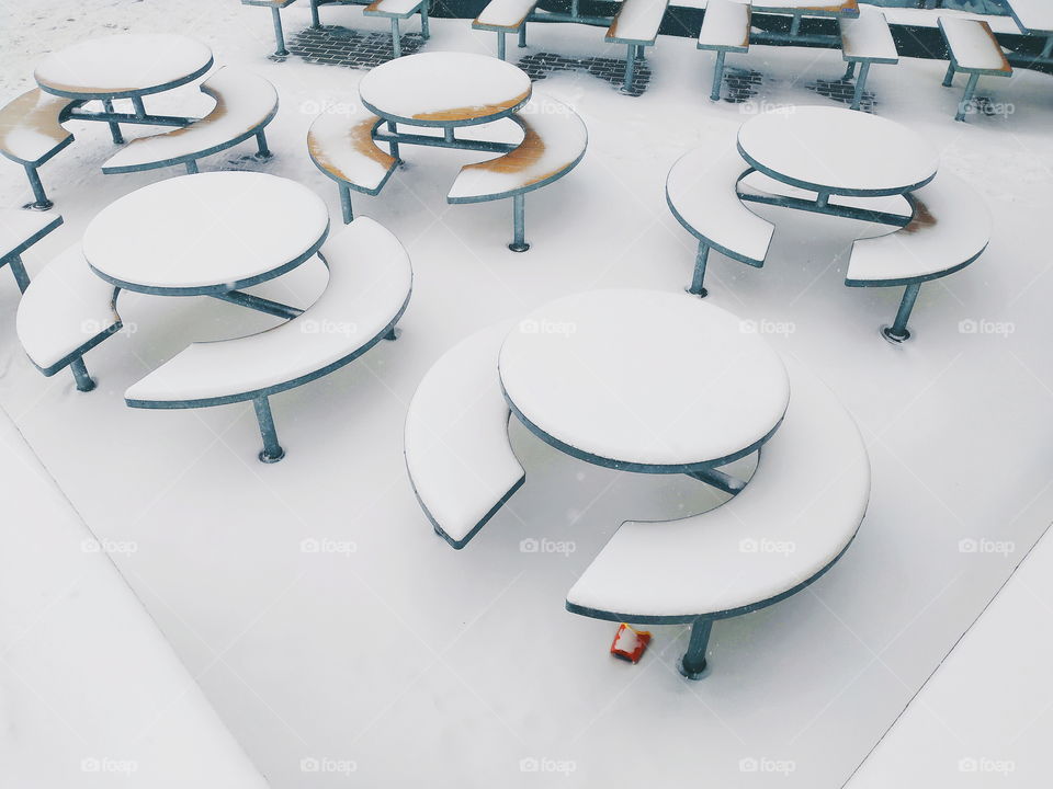 McDonalds tables in the snow in the city of Kiev