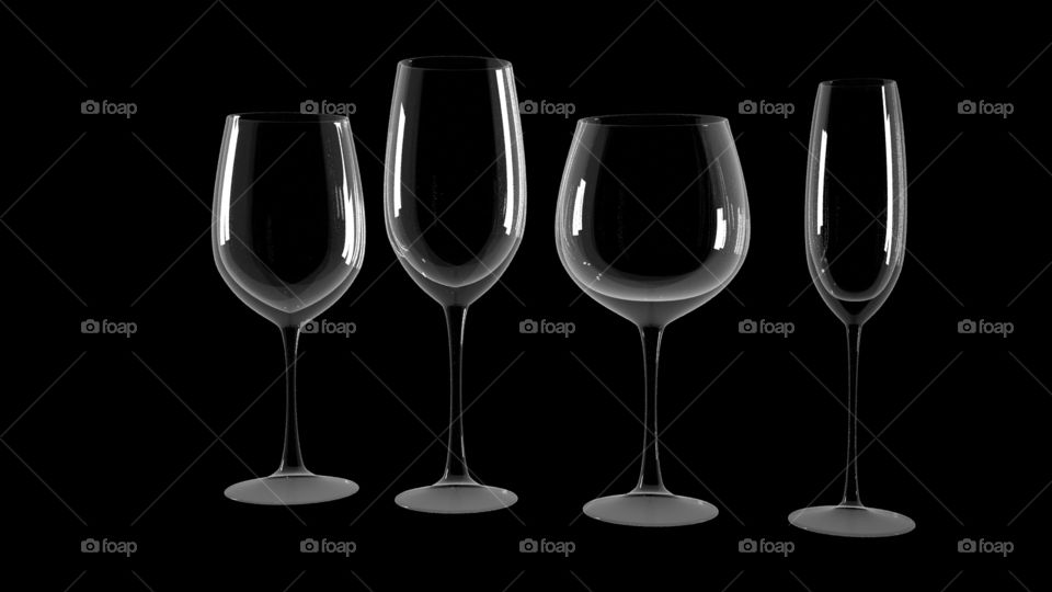 Differrent wine glasses on black background.

Clean and shiny empty cleaner glasses on black background. Beautiful design