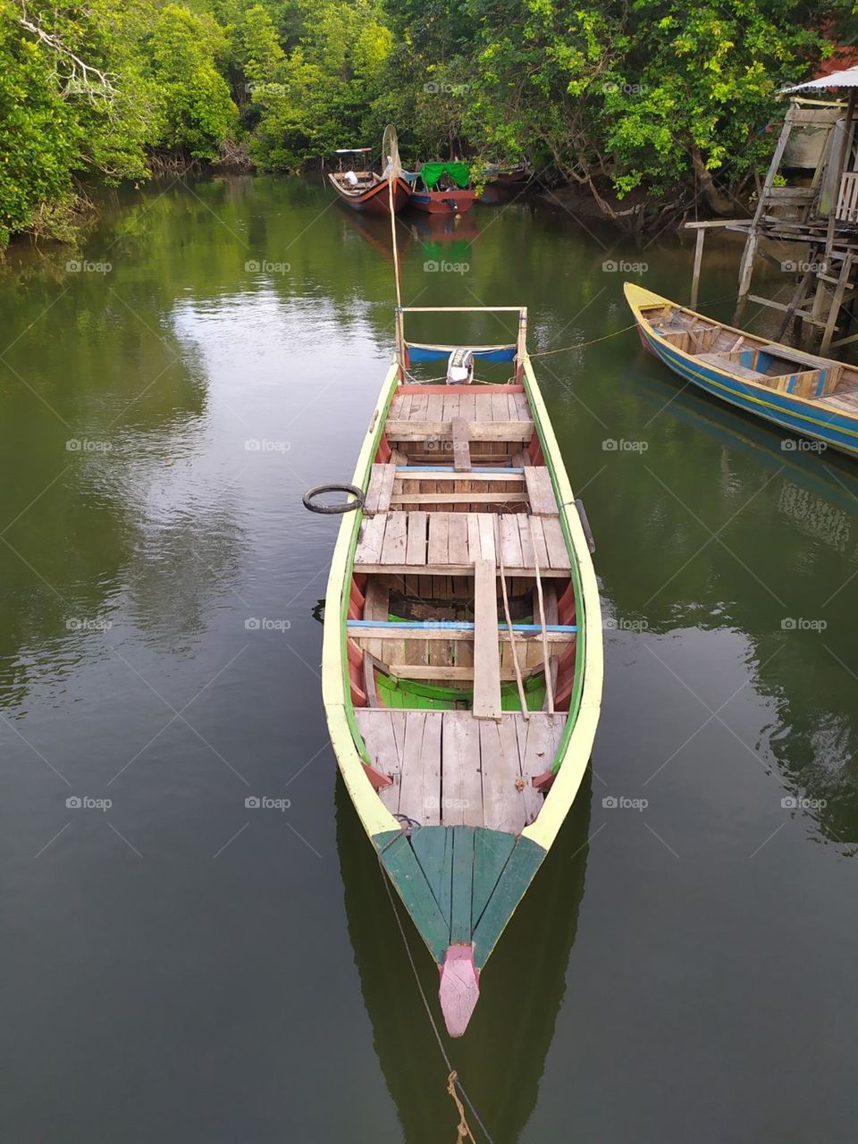 Fishing boats in the mangrove forest in Sambas, West Kalimantan, Indonesia