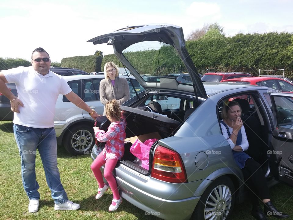 Family near the car