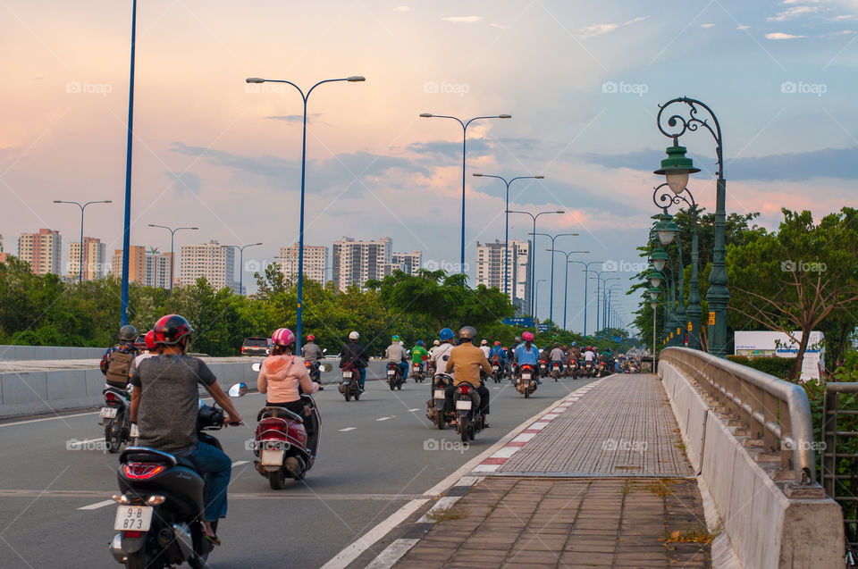 main vehicle in Vietnam is motorbikes. Many motorbike on street in evening, be back home after a long working day