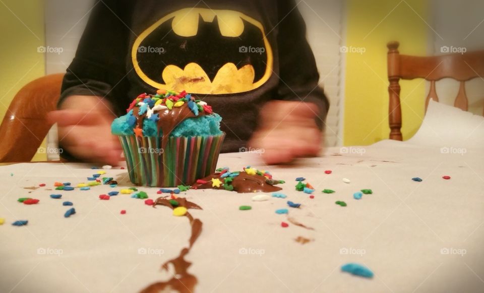 Homemade cupcakes are really yummy, especially when they are blue with a gob of chocolate frosting on top & a rainbow of sprinkles.