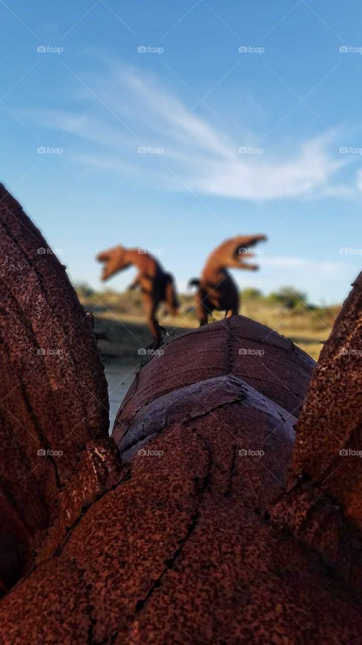 From the unique perspective of riding on a dinosaur while Tyrannosaurus Rexs  chase you