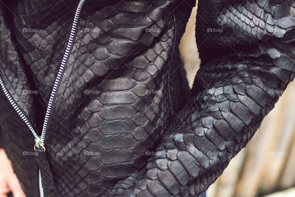 fashionable python leather jacket.