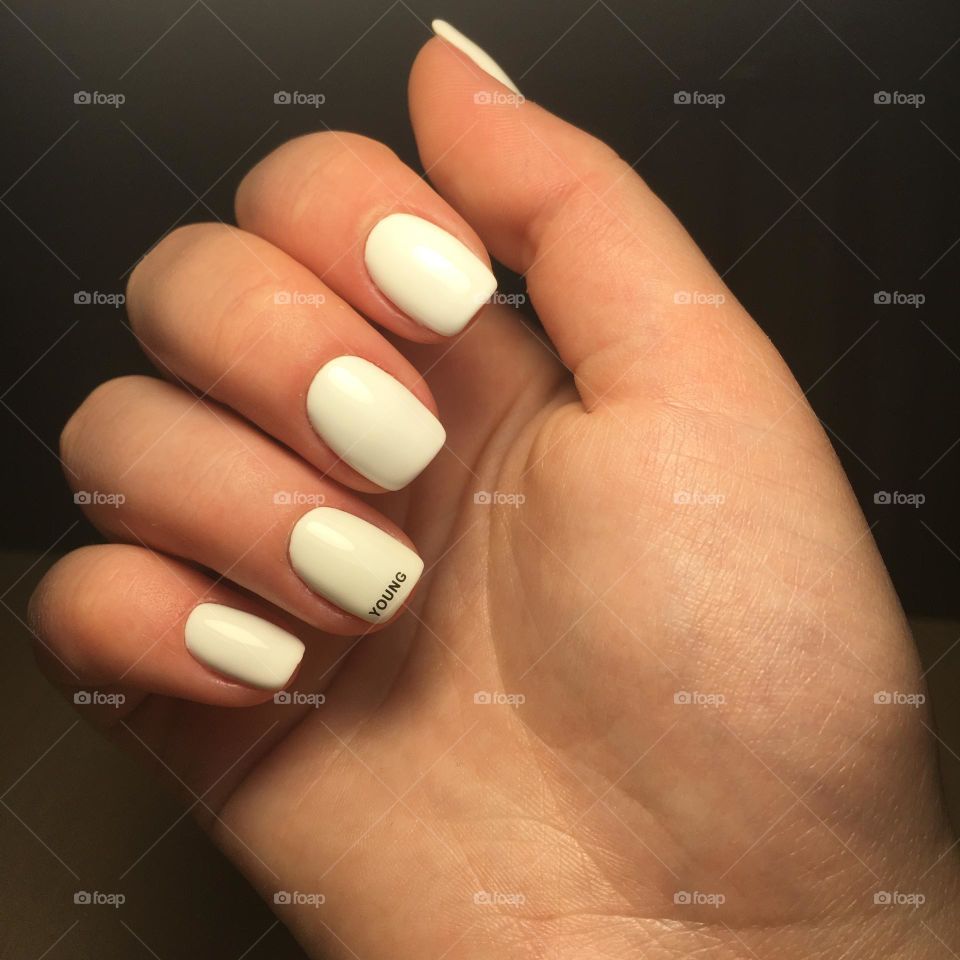 Painted nails, gel polish on nails, women's beautiful and neat manicure