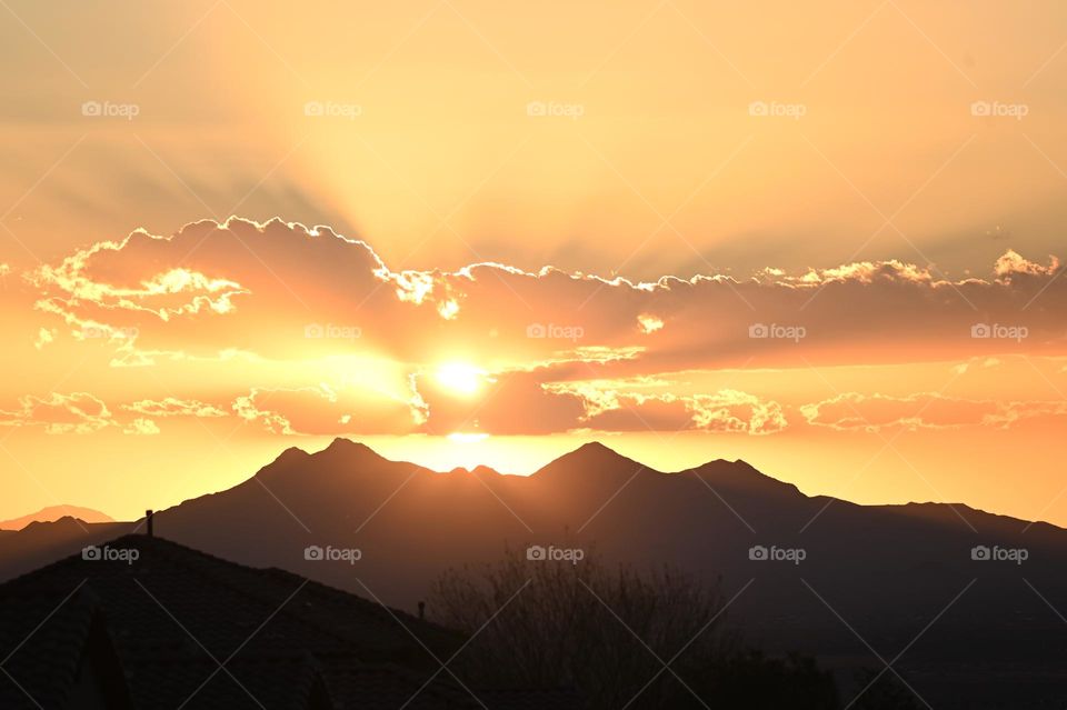 Sun setting over the mountains 