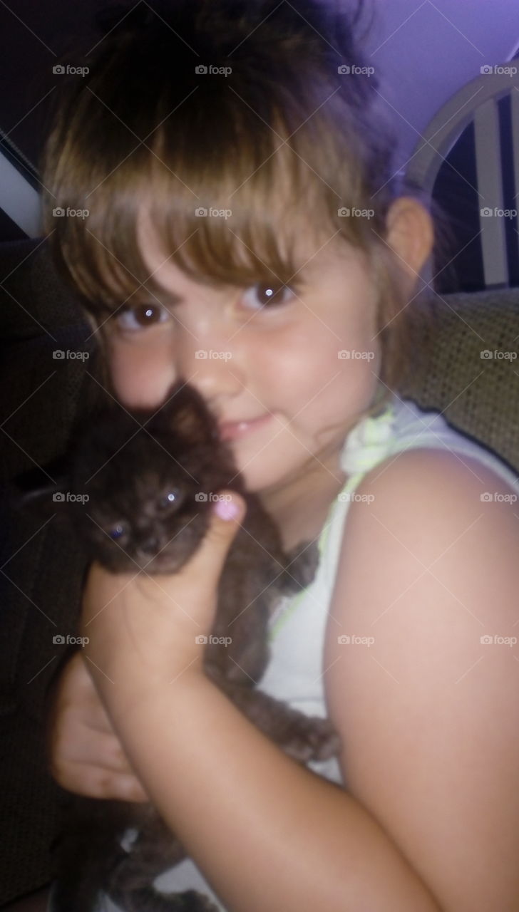 a girl with kitty