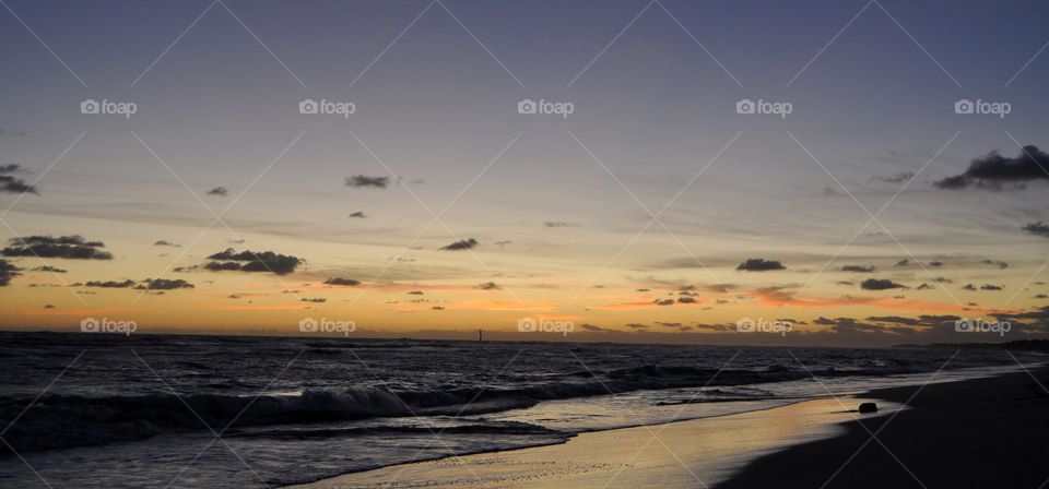 View of beach during sunrise