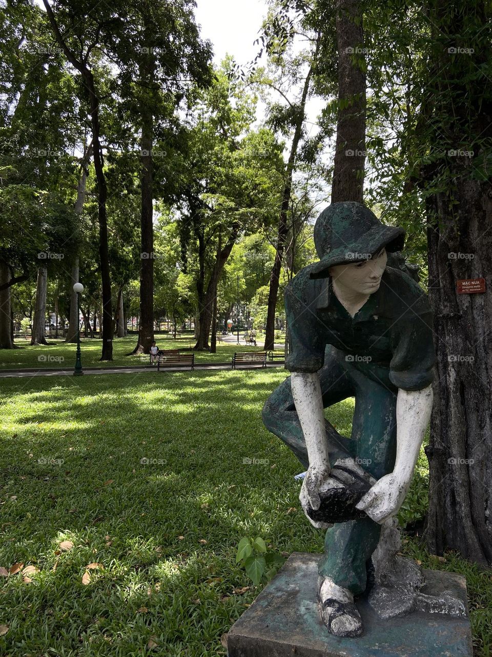 Statue of Vietnam soldier in gardens of Ho chi min 