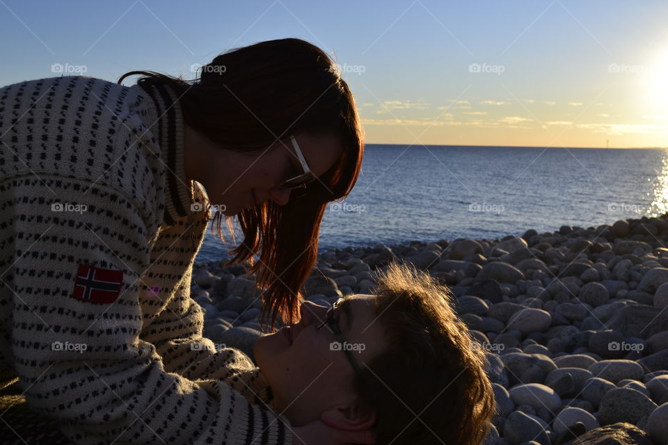 Close-up of a couple at beach