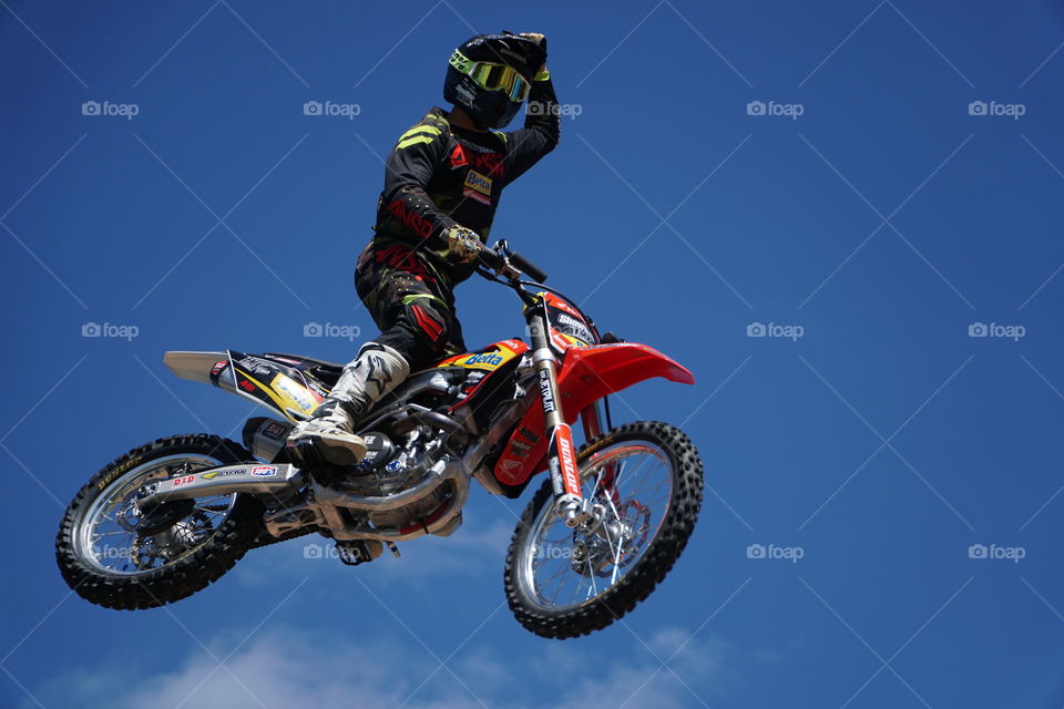 Stunt rider performing on a motorcycle