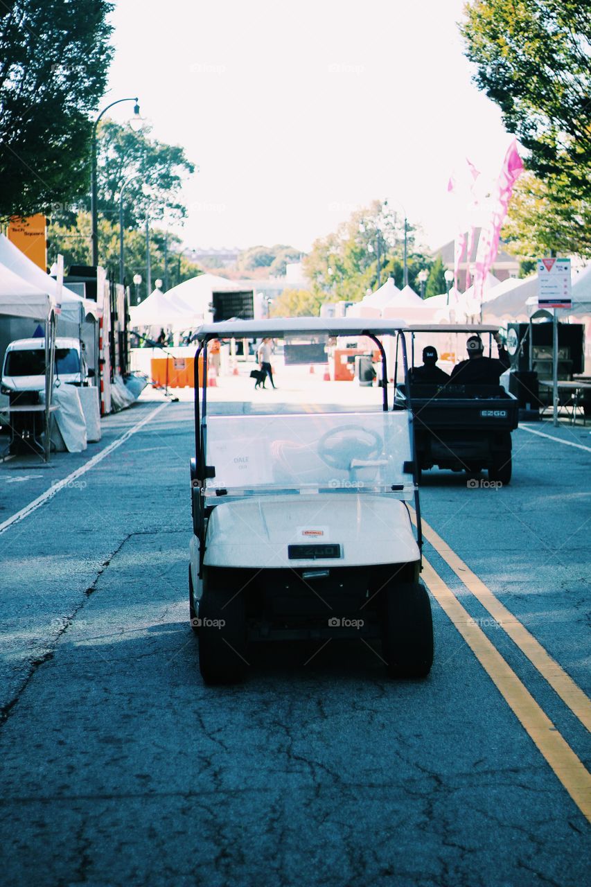 using golf cart to commute in university campus 