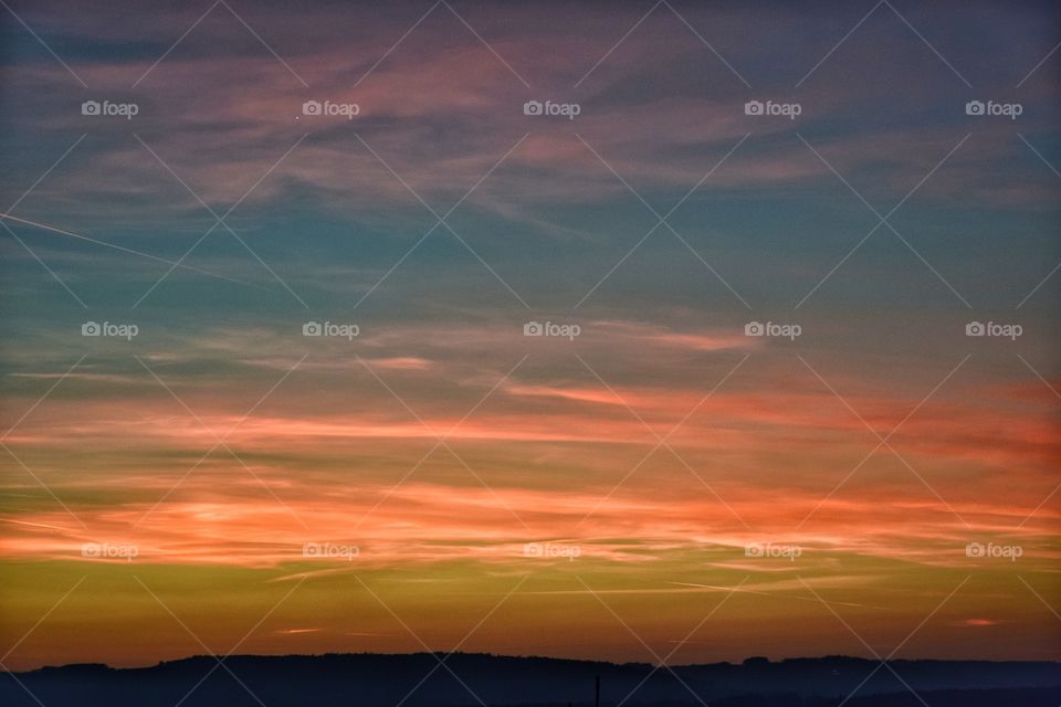 Dramatic orange sky at sunset