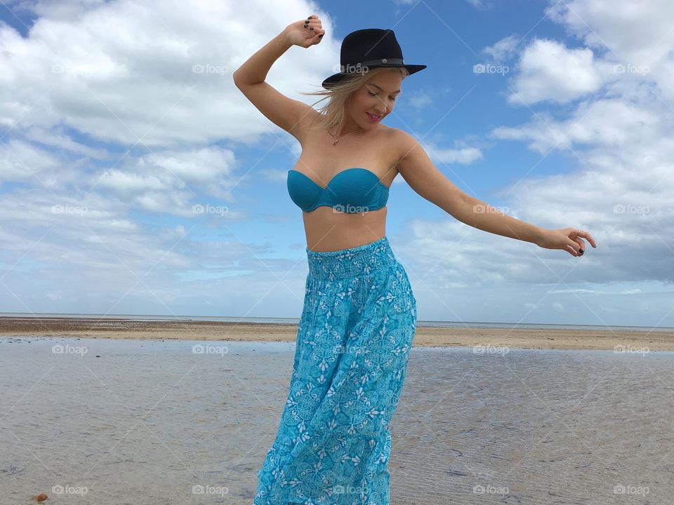 Woman posing at beach