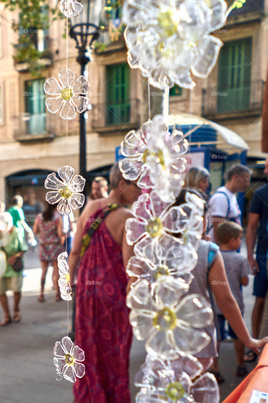 Street decoration. Bottle bottom flowers. 