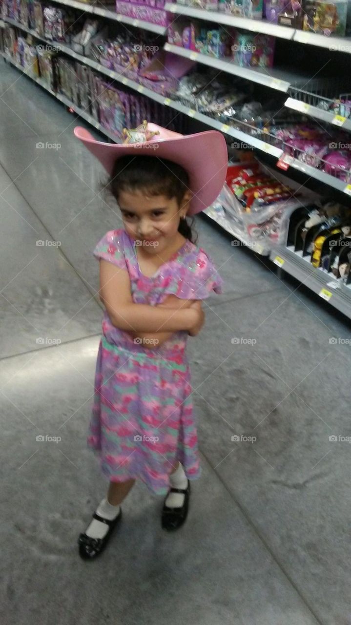 cow girl hanging out in the candy isle