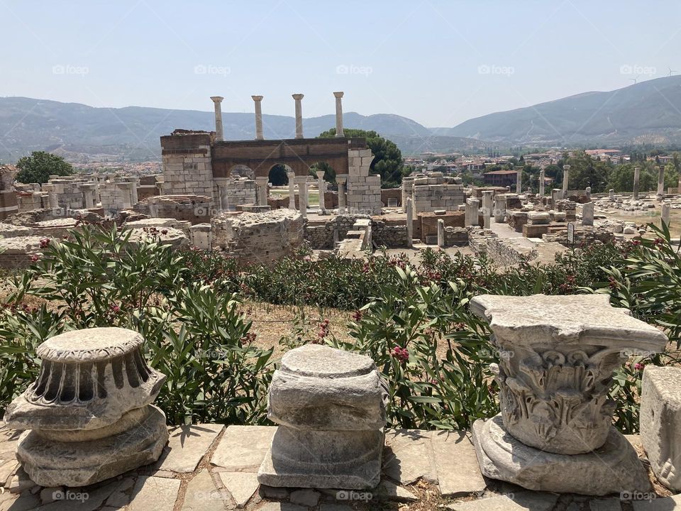 Ancient ruins Sunny holidays I’m Turkey. Walk in the cute city and charming streets by the beach in Kusadasi. perfect blue sky and ocean view. Beach and the shore. To travel is to live. Gorgeous tall palm trees.