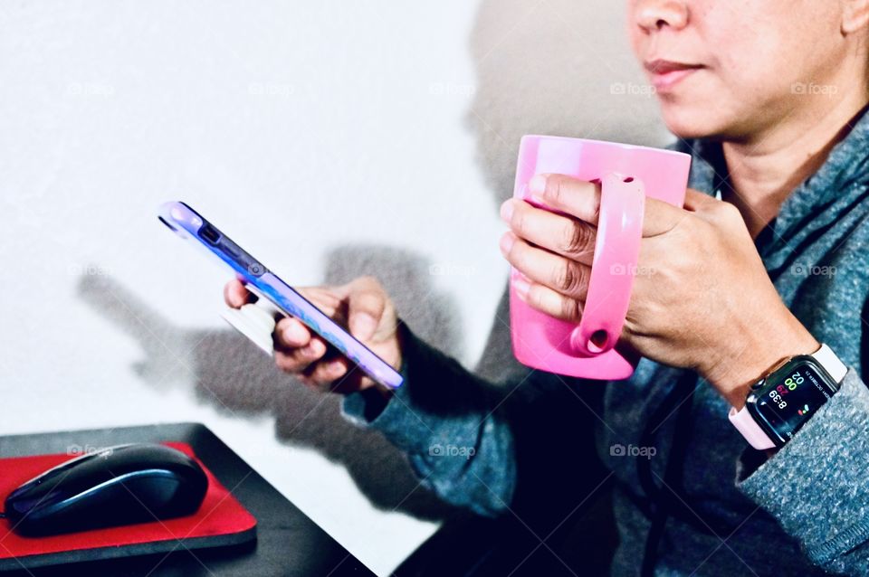 Dealing with the business in the morning with my hot tea. 