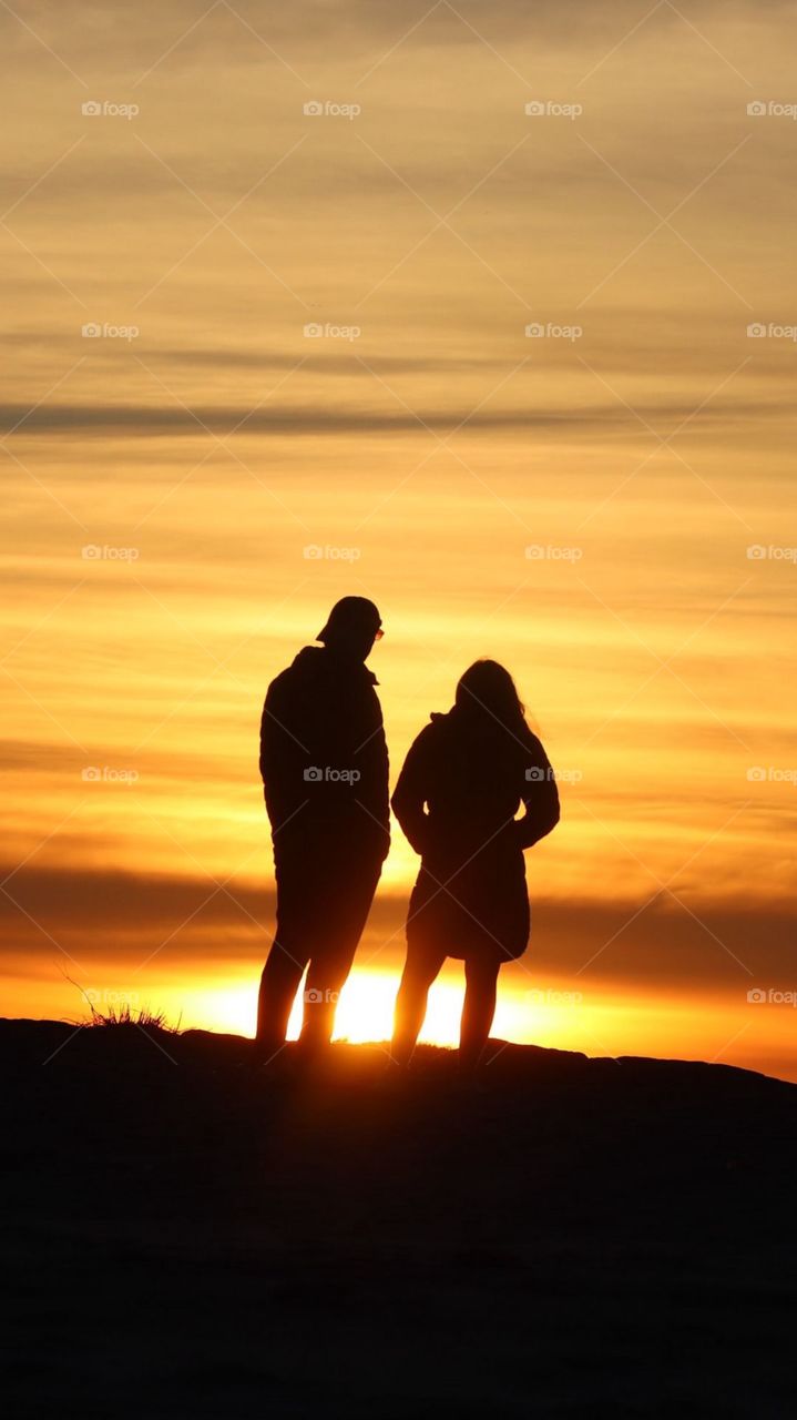Romantic Couple In Evening At Beech