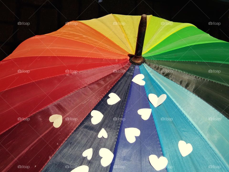 colorful umbrella with the white love