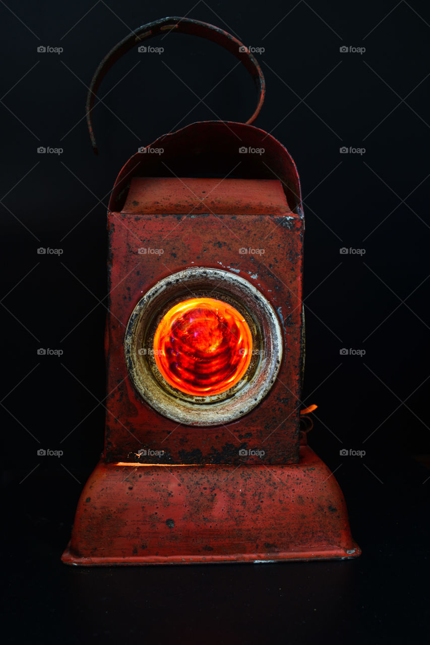 red lantern on black background