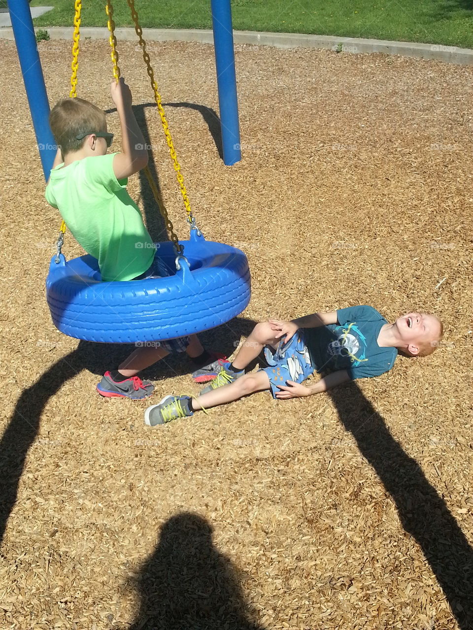 Playing on the tire swing