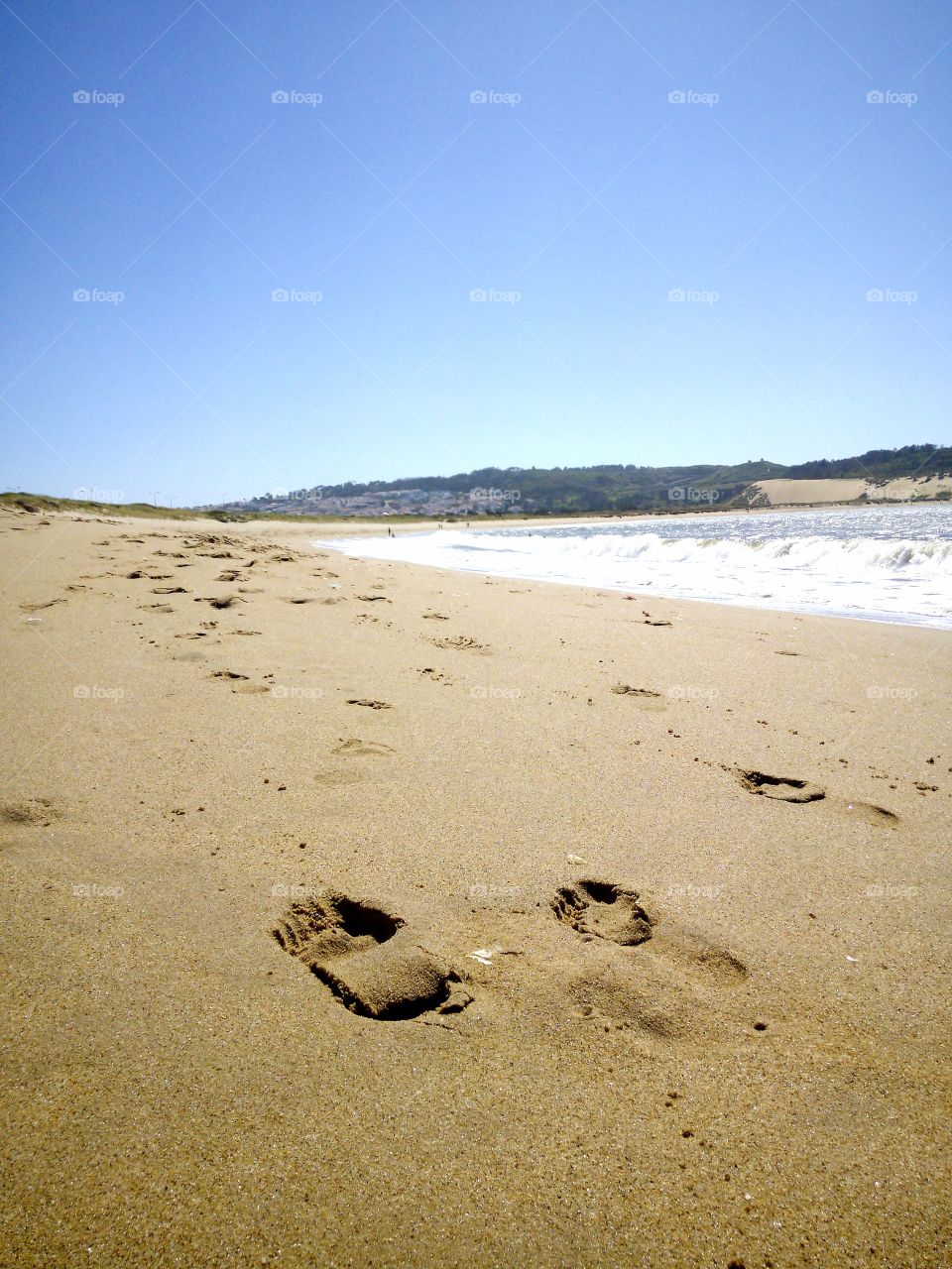footprints on the beach