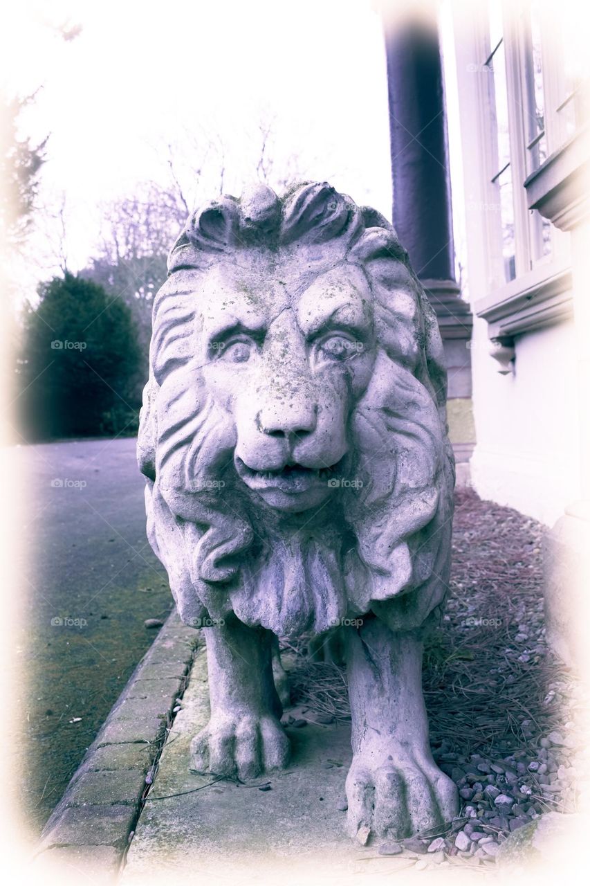 walking lion sculpture