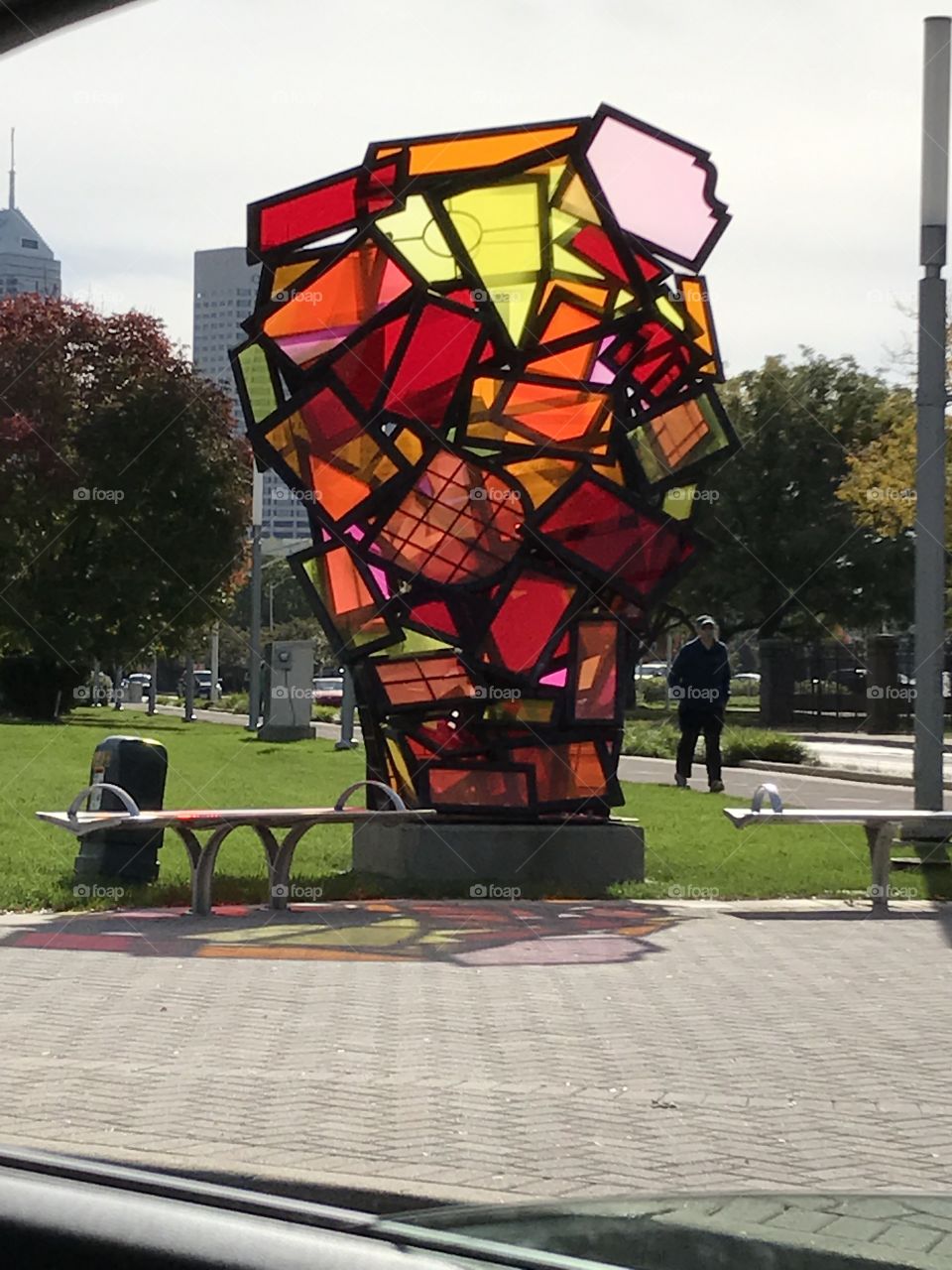 Soon the leaves on the trees will compliment the colors of the glass.