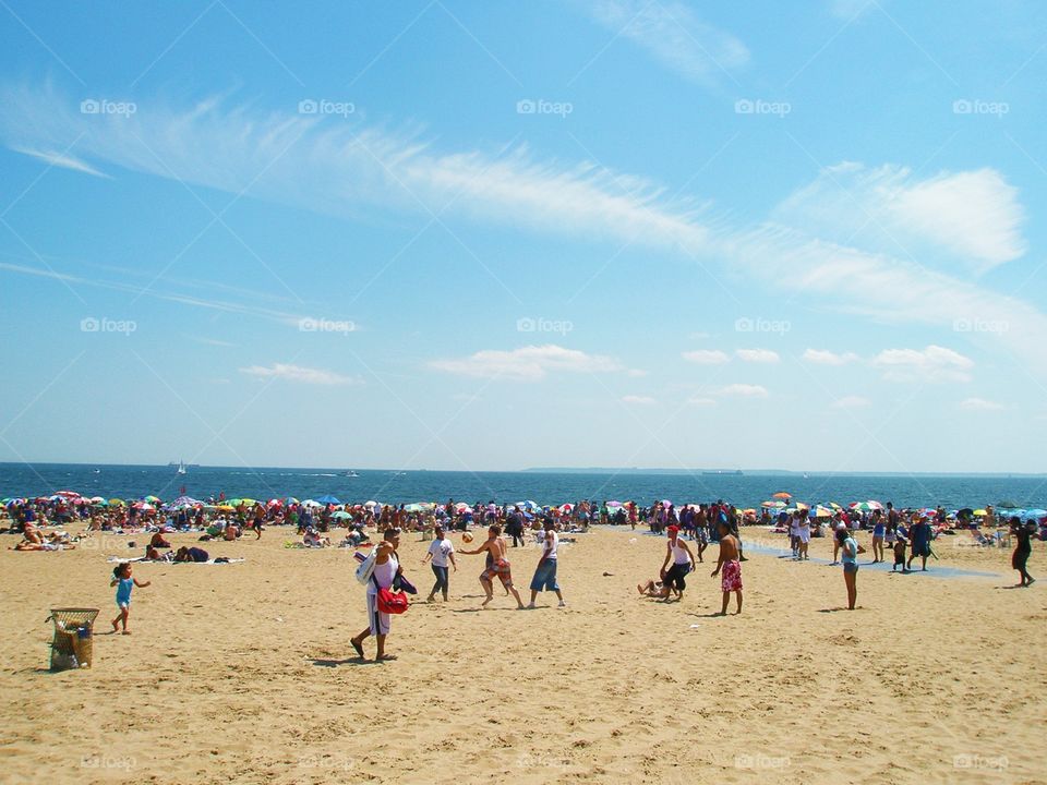 Comey Island beach with umbrellas