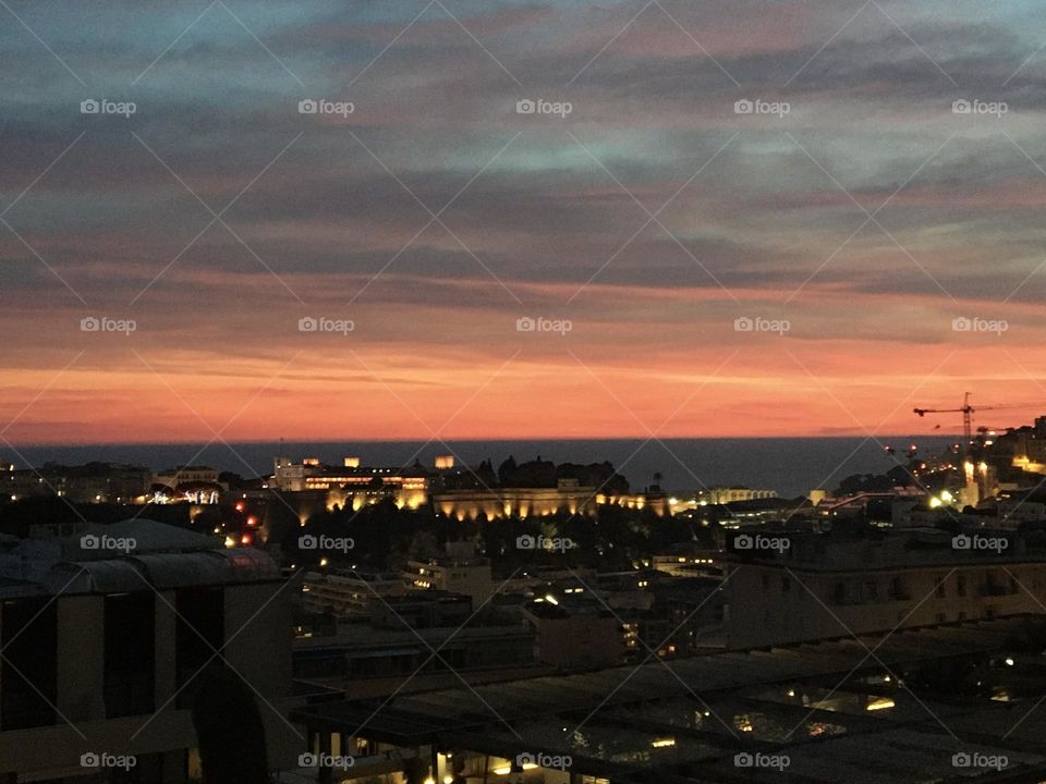 Evening sunset sky on city