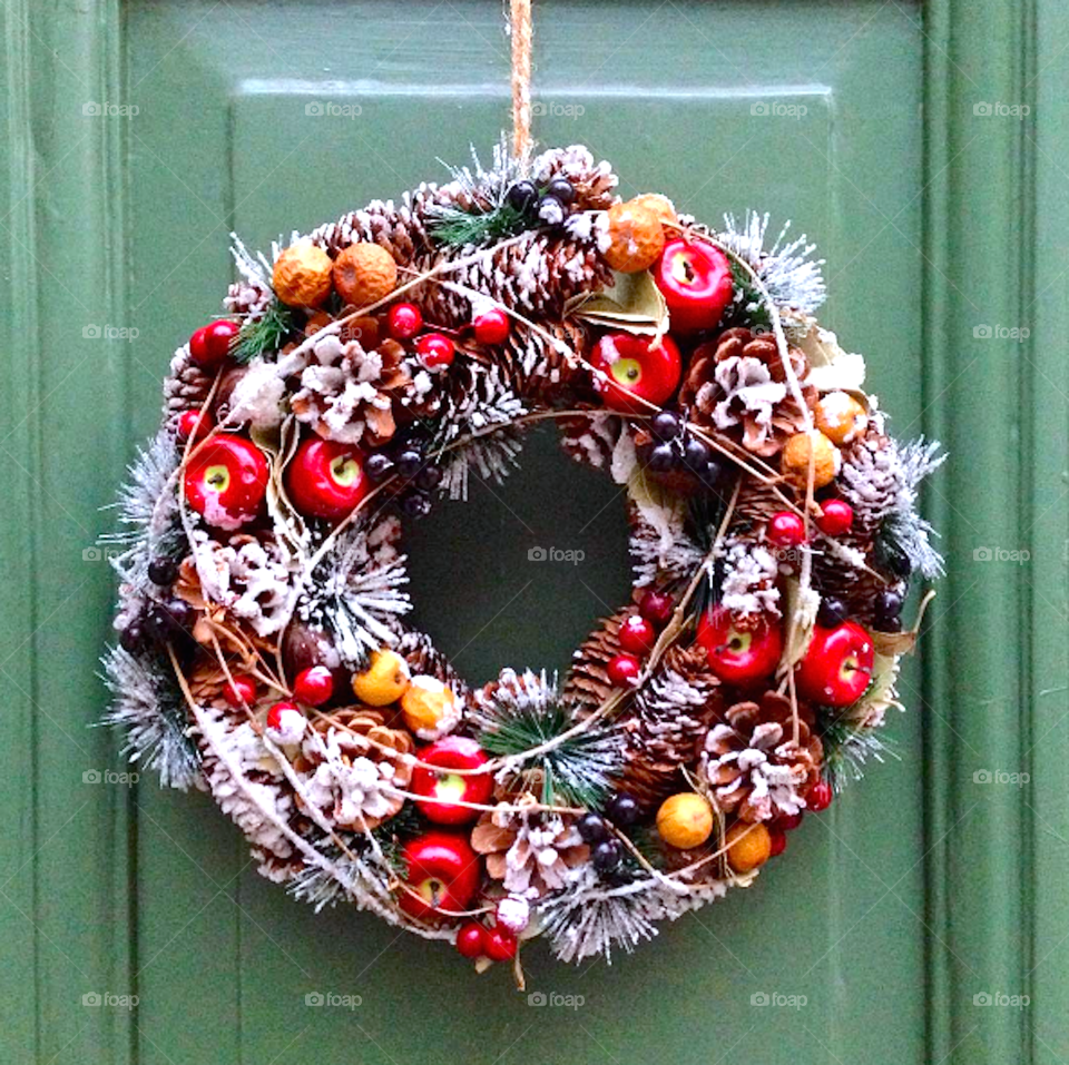 Christmas wreath hanging on a door