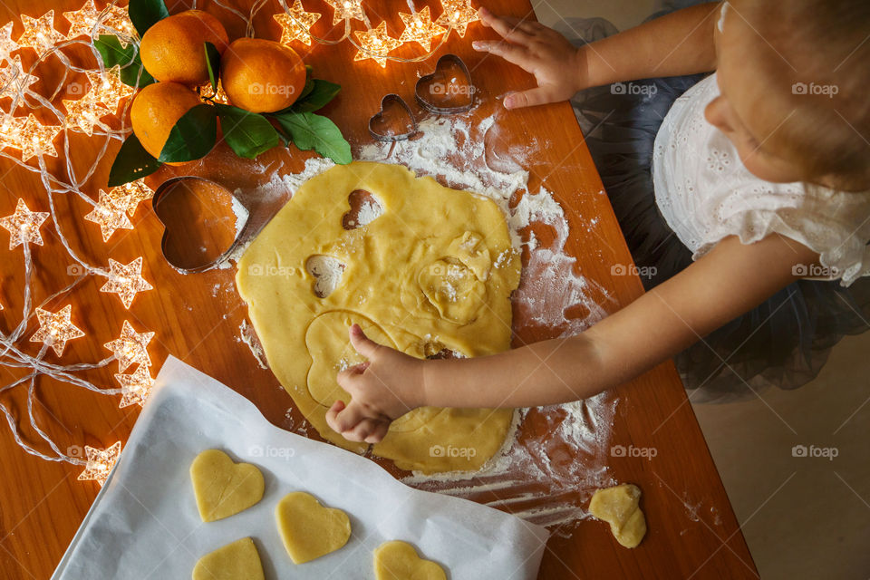 Little girl preparing snacks for Santa