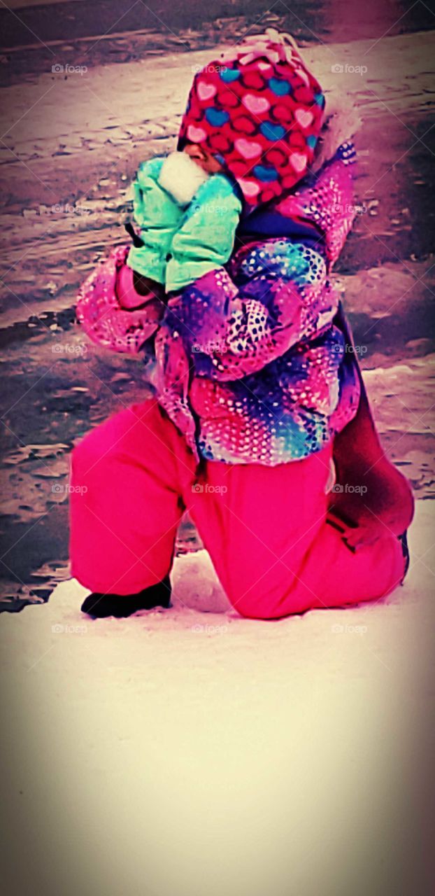 playing in the  snow