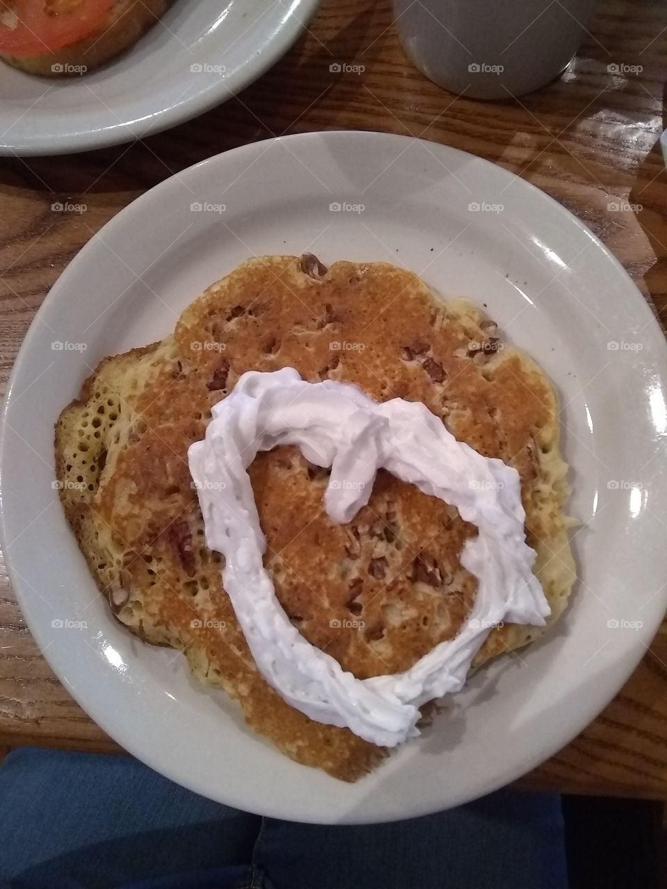 Pecan pancakes are great but they're better with a failed whipped cream heart