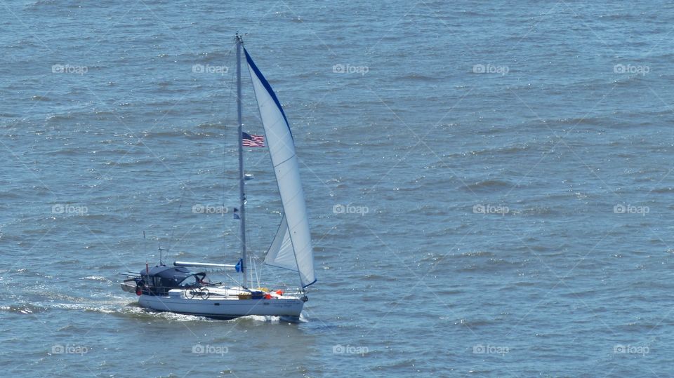 Small private sal boat on Hudson River in New York 