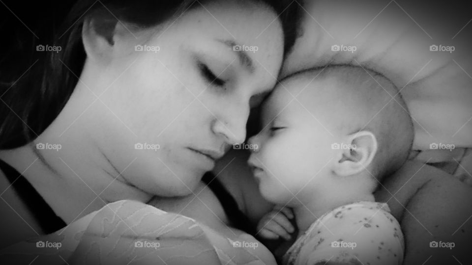 Close-up of a sleeping mother and baby