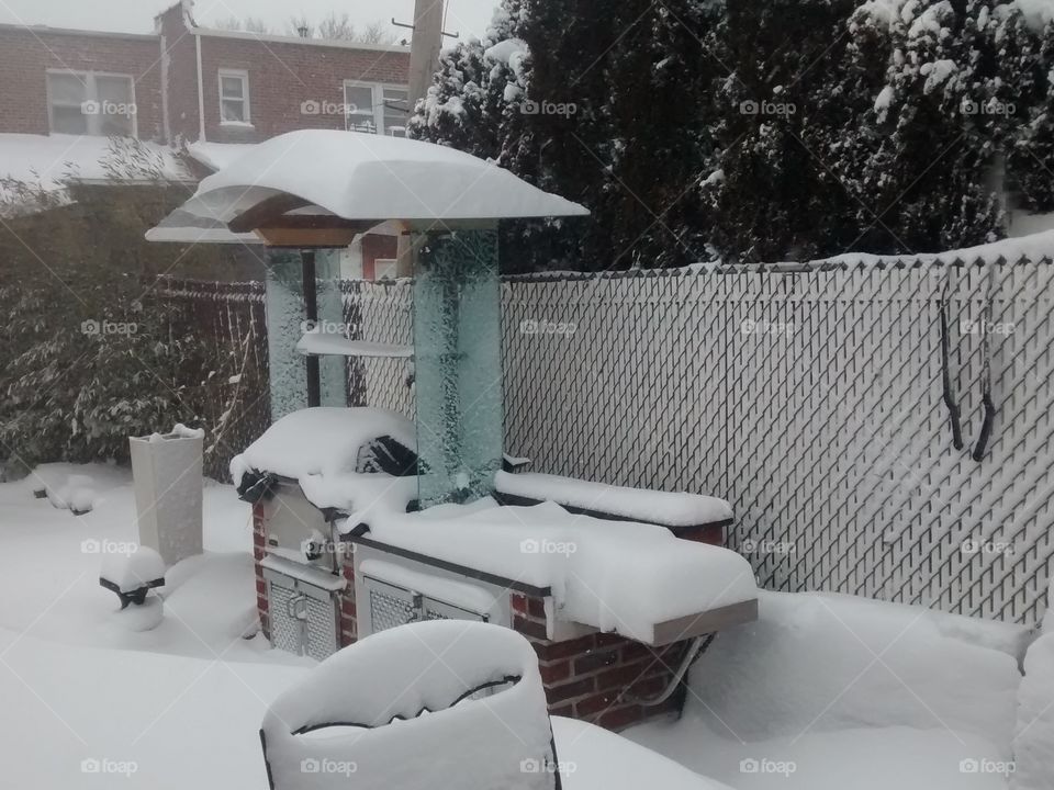 Outdoor Grill Covered in Snow