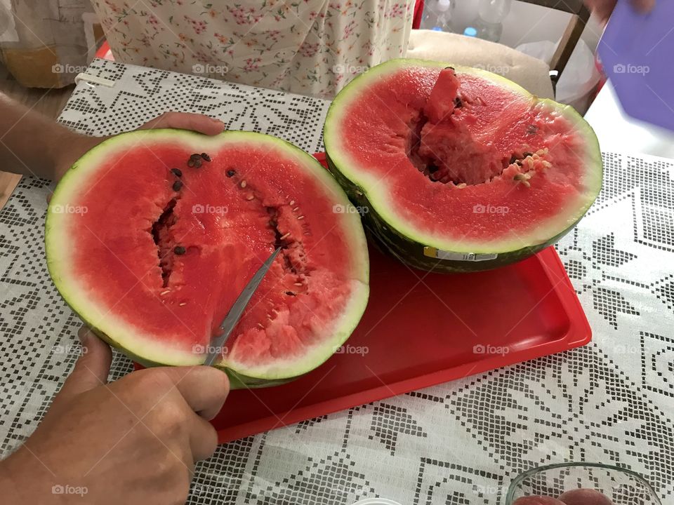 Watermelon sugar high, eating sweet and mellow watermelon during the hot summer days.