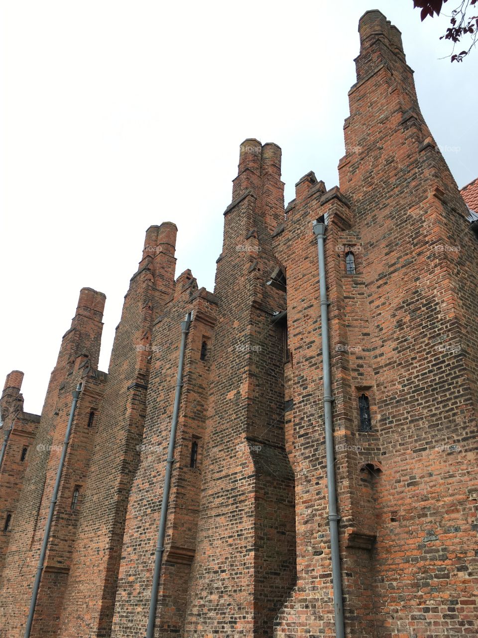 Exterior view of the various elaborate chimneys at the medieval Manor House of Gainsborough Old Hall