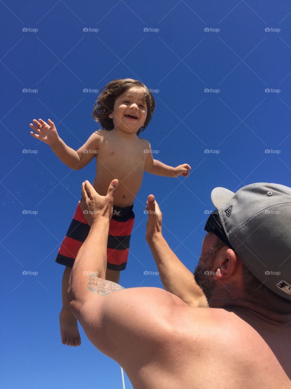 Birthday boy . Spending his 2nd birthday at the beach. His favorite place. 