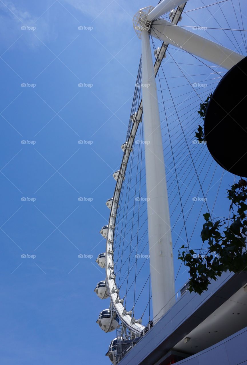 Ferris wheel structure. Photo taken of Ferris wheel in Las Vegas.  Support beams and wires create an interesting perspective when looking up.