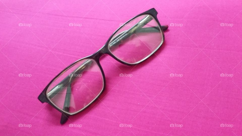gents EyeGlass folded pic with background pink