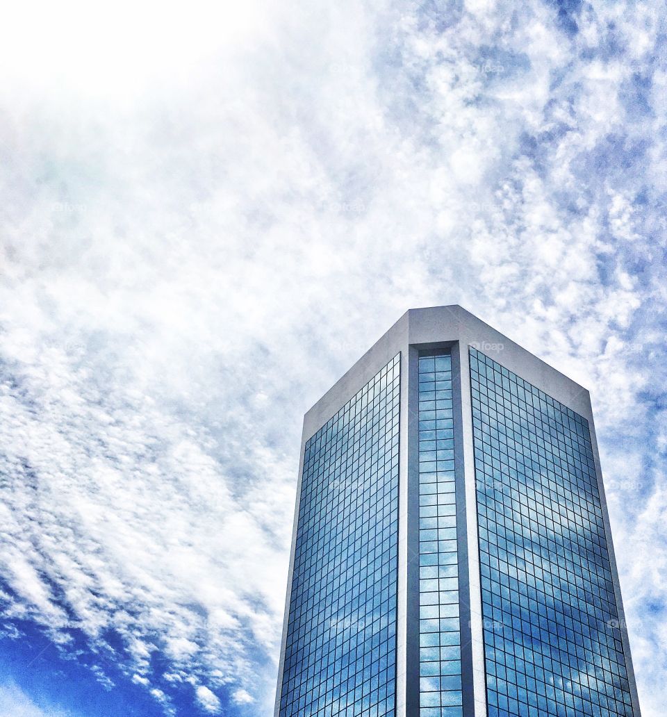 Skyscraper reflection of clouds 