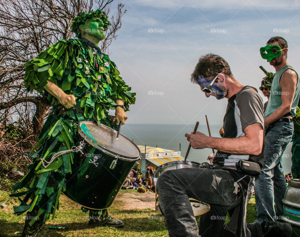 A “Bogey” and another man drum together, at Hastings Traditional Jack in the Green, U.K. 2008