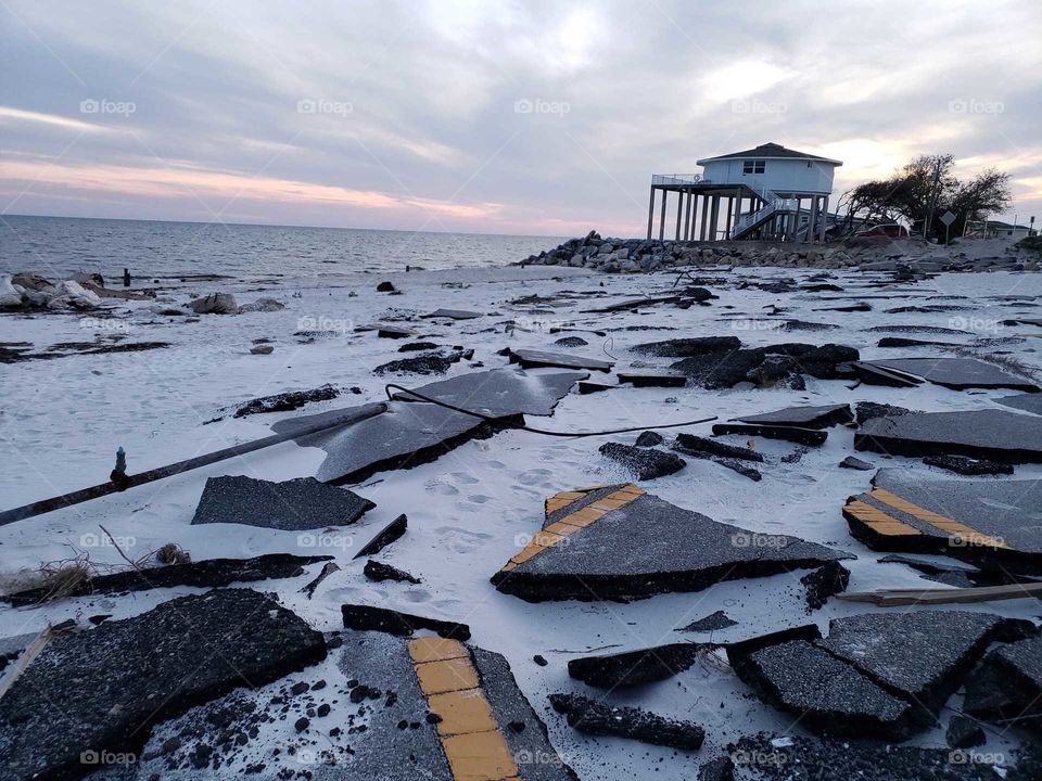 Beachfront road destroyed by a hurricane.