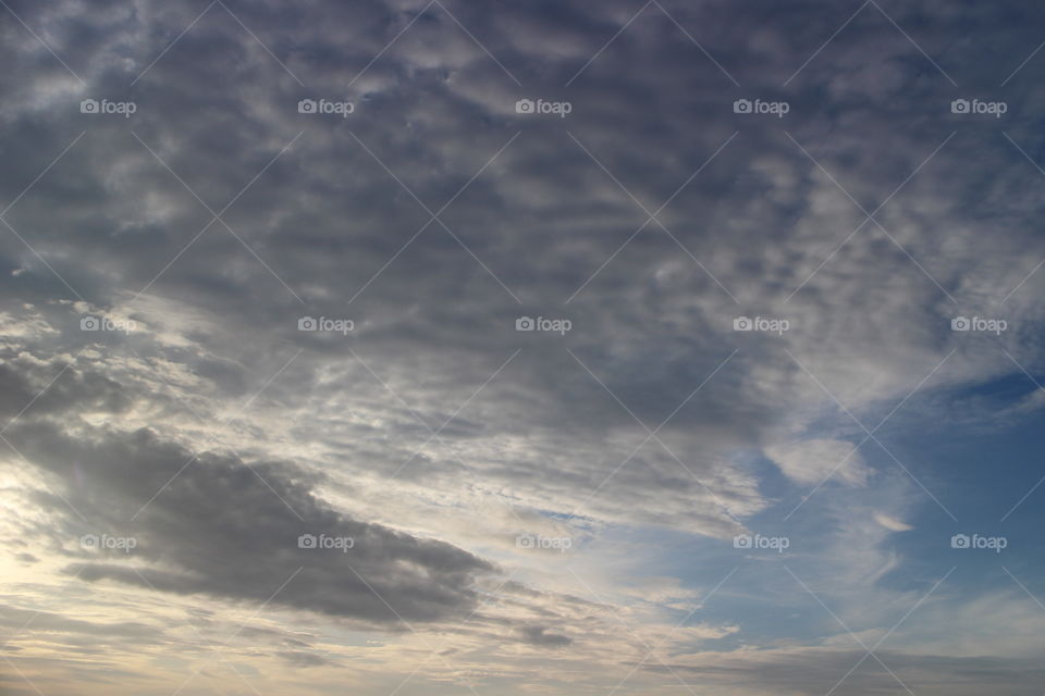Dark cloud in the sky before sunset