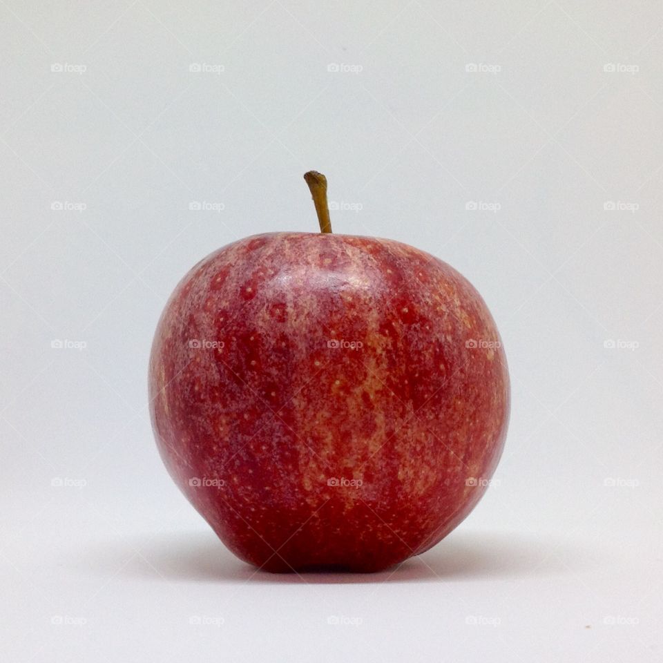 Red apple in white background 
