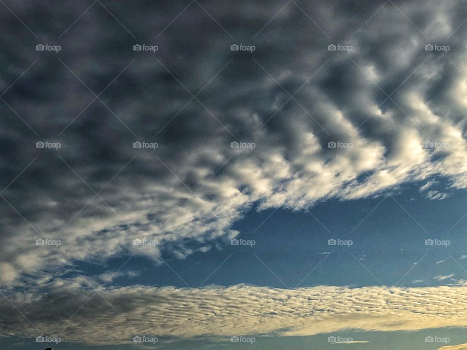 Clouds in the Morning. The day just started, and the clouds in the sky give us a beautiful and unique view.