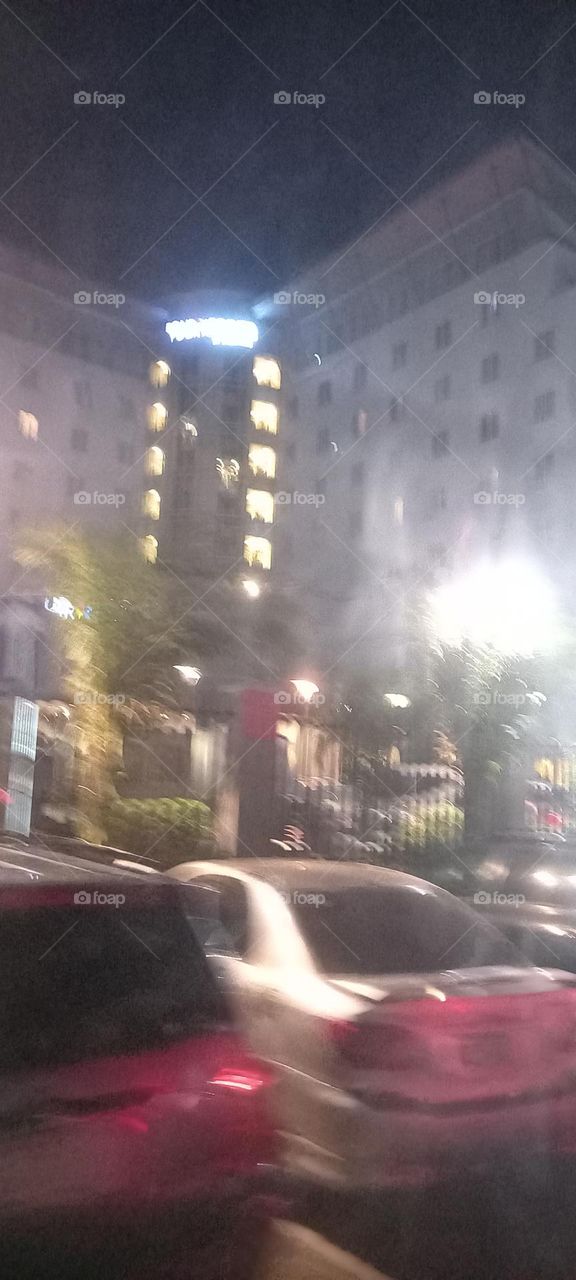 Twinkling windows , the beauty of evening light. Bask in the beauty of evening light with the view of light twinkling from these windows at night